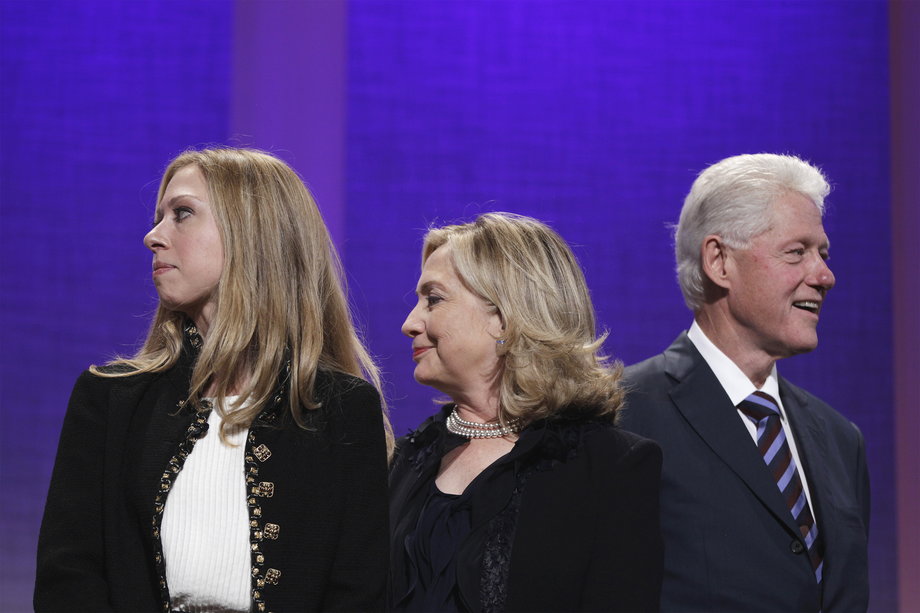 Chelsea Clinton (L), U.S. Secretary of State Hillary Clinton, and former U.S. President Bill Clinton.
