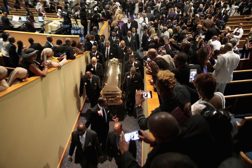 Flowers are seen on the casket of the late singer Aretha Franklin as it is laid to rest at her buria