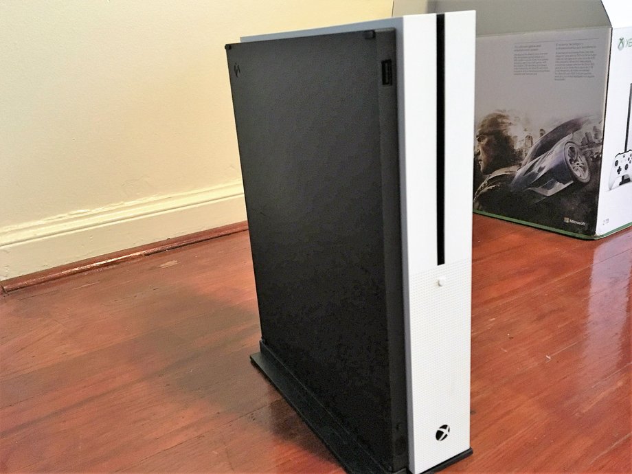 The Xbox One S can be stood up, but probably looks better laying down.