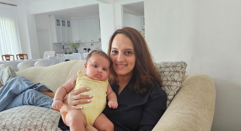 Samira Shihab, a founder and mom of three, holding her newborn baby.Samira Shihab