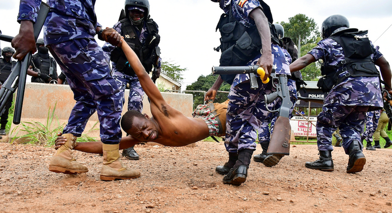 Police detain a protestor in Luuka. In the period leading up to the 2021 presidential and parliamentary elections, over 50 people lost their lives as a result of police and military brutality towards them.