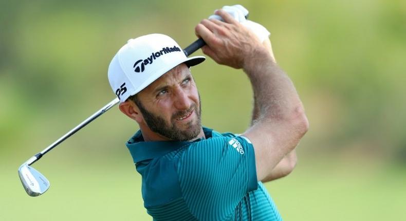 Dustin Johnson of the United States plays a shot during a practice round ahead fo The Players Championship at the Stadium course at TPC Sawgrass on May 10, 2017 in Ponte Vedra Beach, Florida