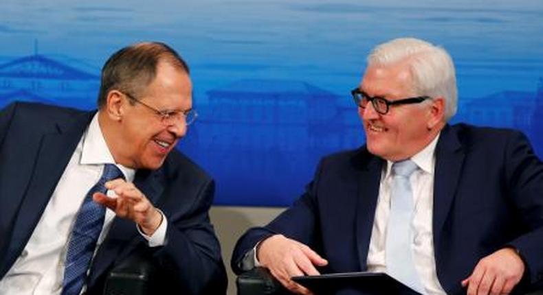 Russian Foreign Minister Sergei Lavrov (L) speaks to German Foreign Minister Frank-Walter Steinmeier at the Munich Security Conference in Munich, Germany, in this February 13, 2016 file picture.