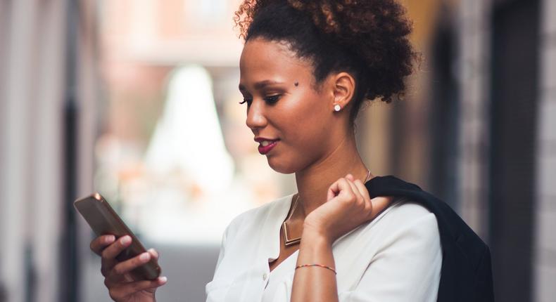 woman using iphone