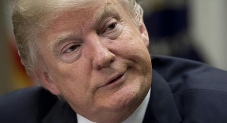 US President Donald Trump speaks during a meeting with county sheriffs in the Roosevelt Room of the White House in Washington, DC, February 7, 2017