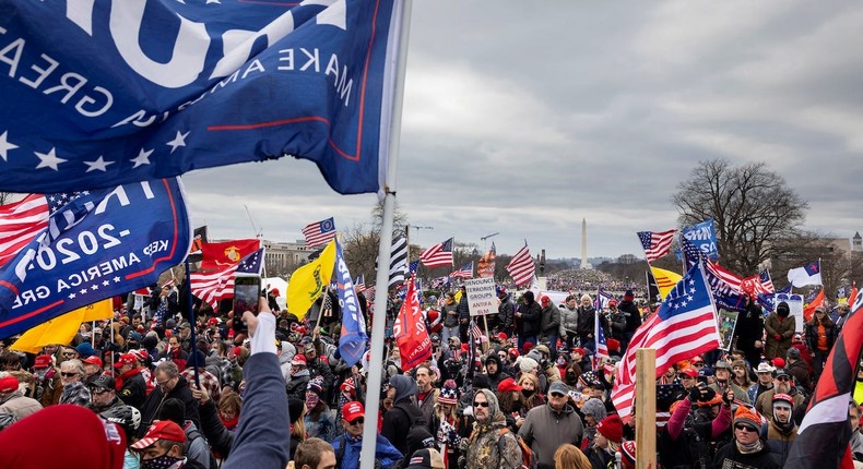 Rioters clashing with police and security forces at the US Capitol.