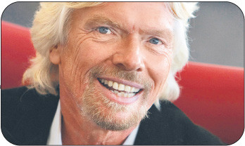 BIO: Richard Branson znany jest z niekonwencjonalnych metod promocji swoich produktów. Szef Virgin Group reklamowął sieć komórkową wisząc nad Times Square ubrany w przepaskę z telefonów Fot. Bloomberg