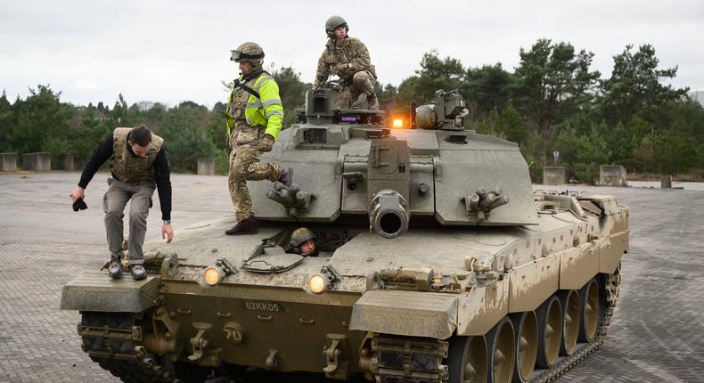 Ukrainian recruits and their British Armed Forces trainers complete a session on the operation of a Challenger II tank at a military facility, on February 23, 2023 in Southern England.Leon Neal/Getty Images