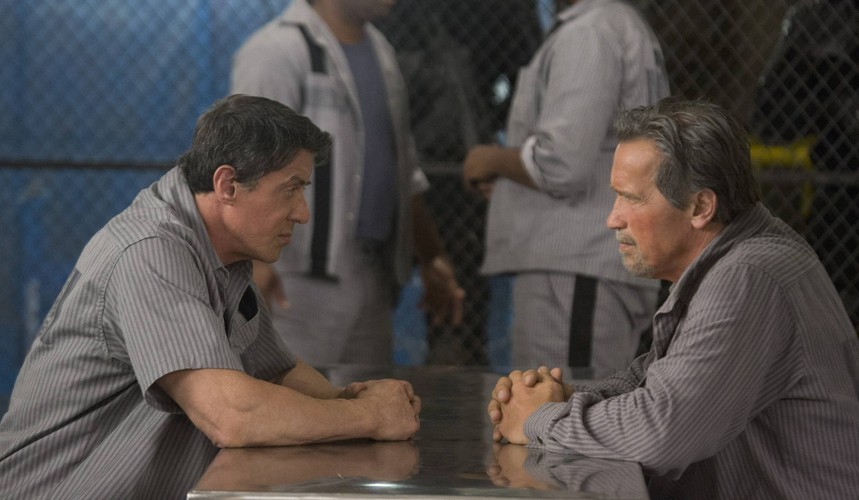 Sylvester Stallone i Arnold Schwarzenegger w filmie 'Plan ucieczki'