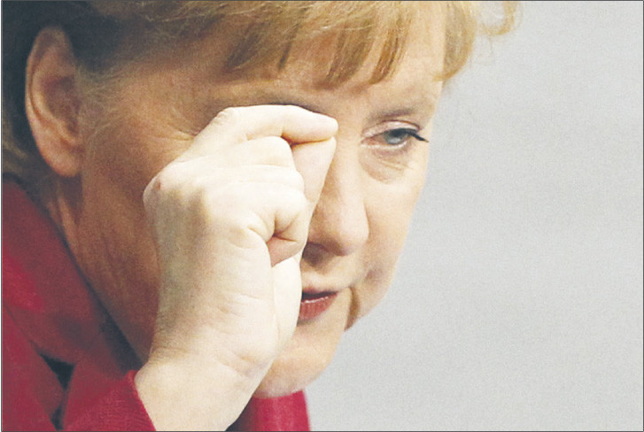 Merkel chce, aby banki uczestniczyły w ratowaniu Aten Fot. Reuters/Forum