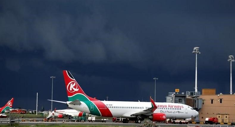 Kenya Airways planes are seen parked at the Jomo Kenyatta International airport in Kenya's capital Nairobi, April 28, 2016. 
