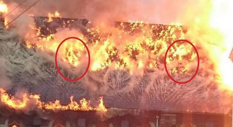 The church flames with faces in it