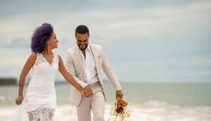 Black couple on their wedding day [iStock]