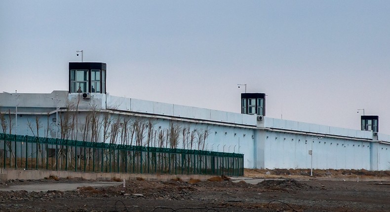 Guard towers on the perimeter wall of the Urumqi No. 3 Detention Center in Dabancheng in western China's Xinjiang Uyghur Autonomous Region on April 23, 2021.AP Photo/Mark Schiefelbein, File