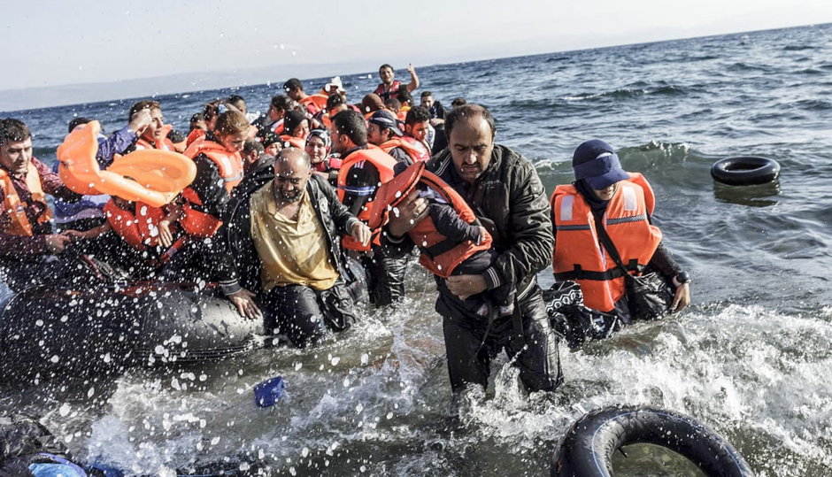 Syrian refugees arrive on the shores of Lesvos island