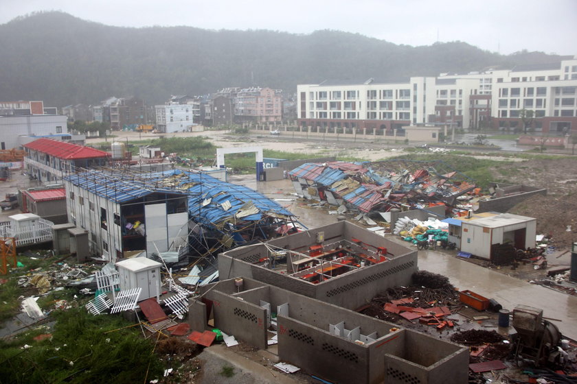 Cars are partially submerged in floodwaters after Typhoon Lekima hit Dajing town in Wenzhou, Zhejian