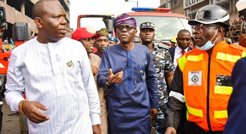 R-L: General Manager, Lagos State Emergency Management Agency (LASEMA), Dr Femi Osanyintolu; Lagos State Governor, Mr Babajide Sanwo-Olu; Commissioner for Special Duties and Inter-Governmental Relations, Dr Adewale Ahmed and Special Adviser to the Governor on Central Business District (CBD), Prince Anofiu Elegushi, during the Governor’s visit to the scene of the fire incident at Balogun Market, Lagos Island, on Wednesday. [NAN]