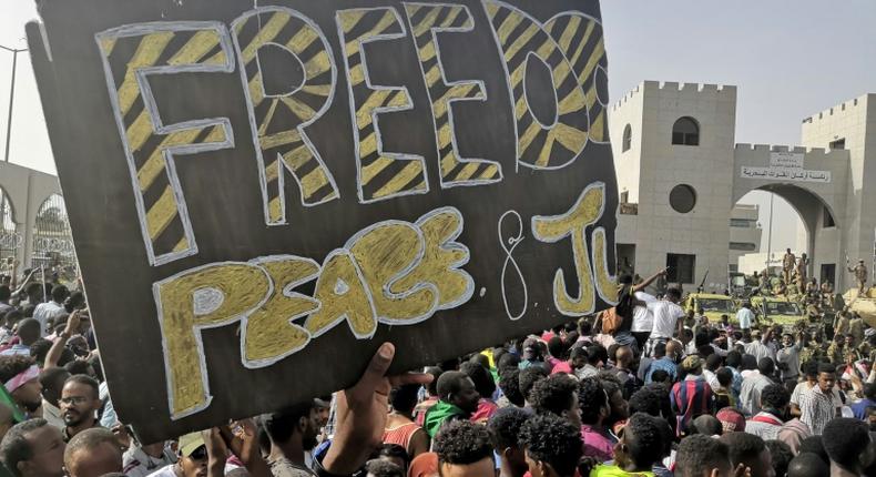 Sudanese demonstrators rally outside the army headquarters even after the toppling of veteran ruler Omar al-Bashir