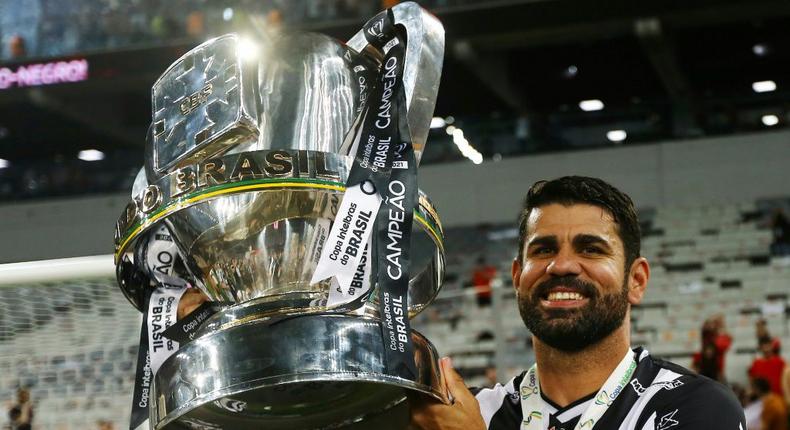 Diego Costa, pictured in Decemember 2021 with the Brazilian Serie A trophy he won with Atletico Mineiro Creator: Heuler Andrey