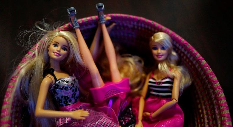 Plastic made Barbie figures of U.S. toy manufacturer Mattel are seen inside a basket at a children's indoor playing area in Hanau near Frankfurt, Germany, March 15, 2016.    REUTERS/Kai Pfaffenbach/File Photo