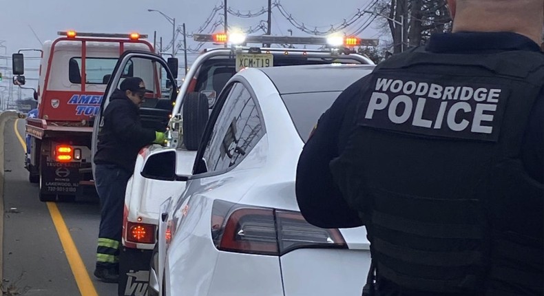 Police at the scene after the steering wheel fell of a brand new Tesla.Courtesy of Prerak Patel