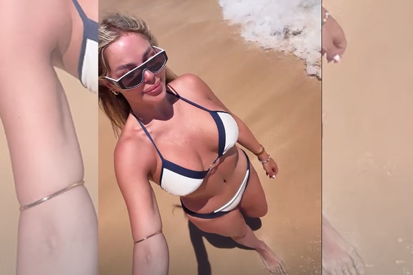 ZAPLJUSKUJU JE TALASI, A ONA U UBITAČNOM BIKINIJU Sevaju rasne obline na Nataši Rodić! Nabacila ten, svi se okreću za njom (VIDEO)