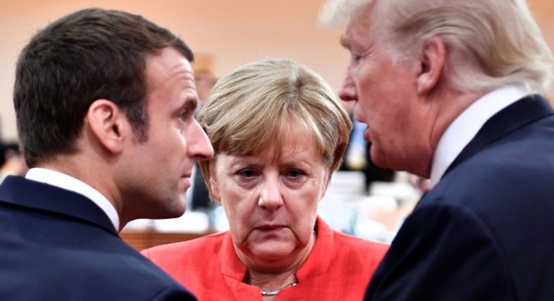 Three's a crowd? Macron, Merkel and Trump share a moment at the G20 summit in Hamburg