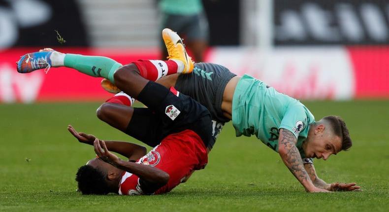 Everton defender Lucas Digne (right) fouls Southampton's Kyle Walker-Peters