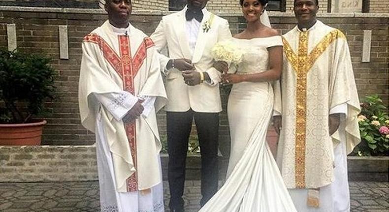 Mr and Mrs Ajibade with the priests