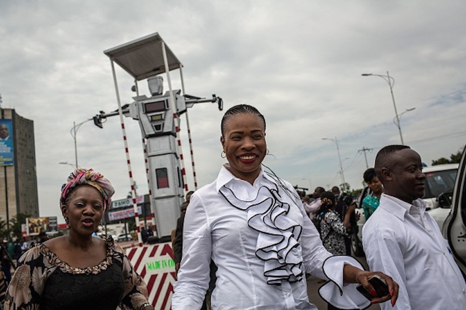 Therese Inza (C), president of the Congolese branch of ' Women technologies', the society which developed three new human-like robots that were recently installed in Kinshasa.