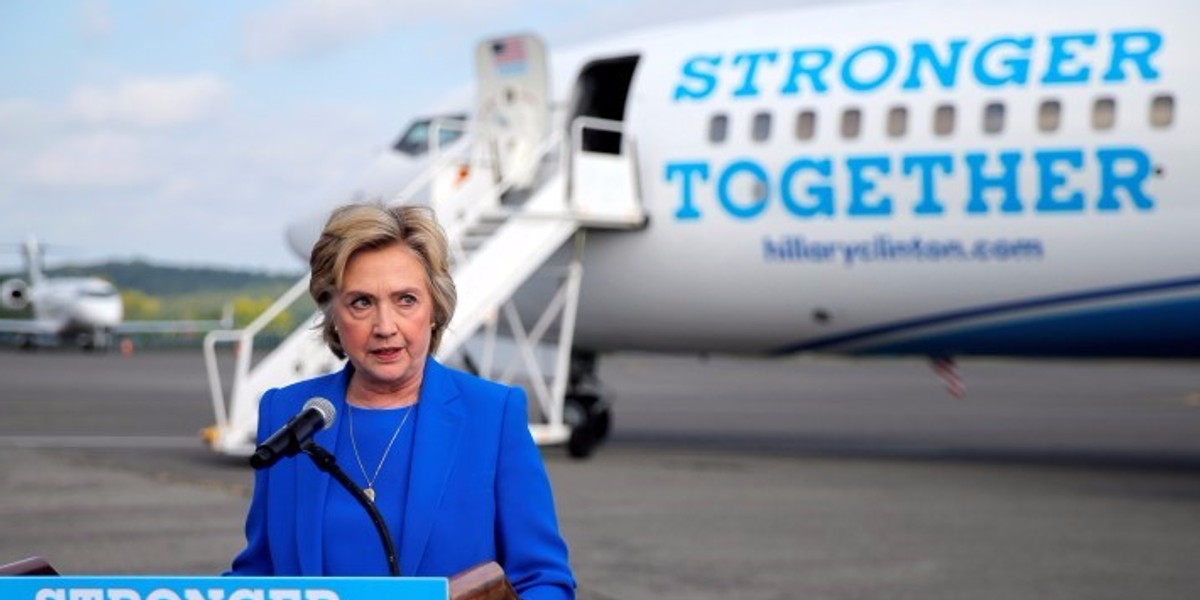 U.S. Democratic presidential candidate Hillary Clinton holds a news conference on the airport tarmac in front of her campaign plane in White Plains