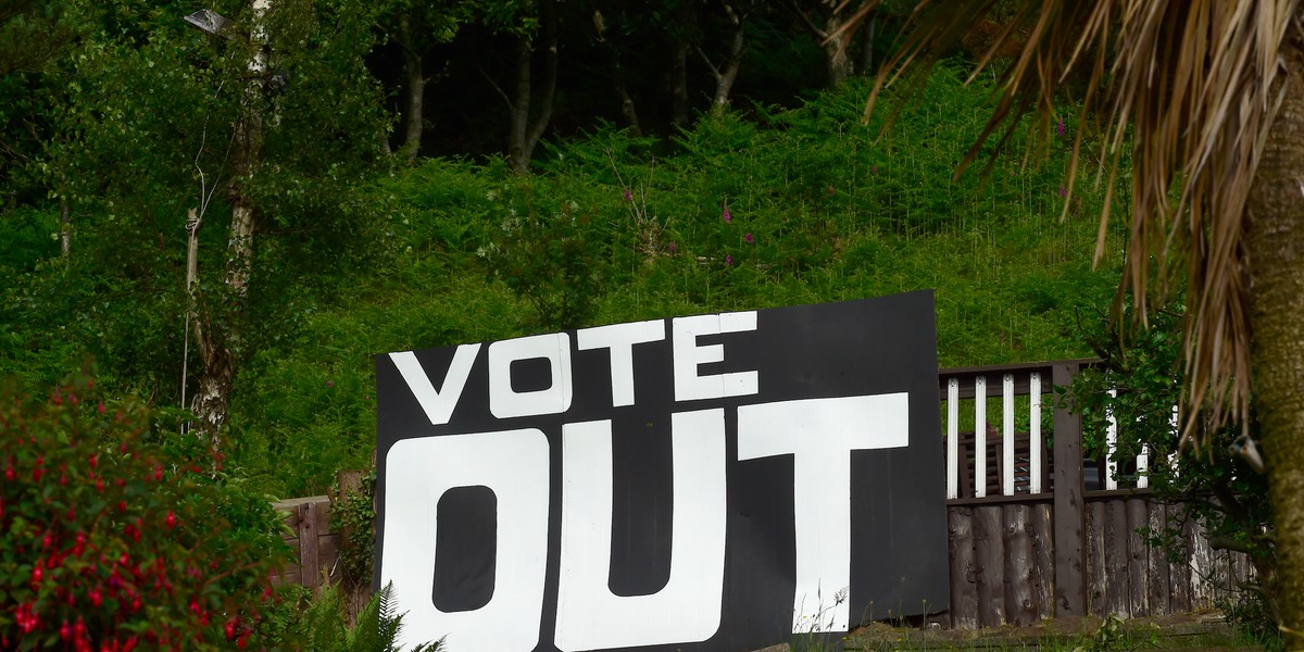 A sign is displayed opposite the M4 near Tata Steel works, on the day of the EU referendum, in Port Talbot in Wales.