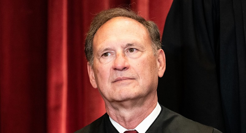 Associate Justice Samuel Alito sits during a group photo of the Justices at the Supreme Court in Washington, DC on April 23, 2021.