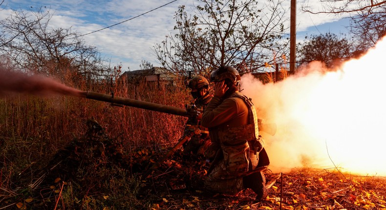 Members of Ukraine's National Guard Omega Special Purpose fire a SPG-9 anti-tank grenade launcher toward Russian troops in the front line town of Avdiivka, amid Russia's attack on Ukraine, in Donetsk region, Ukraine November 8, 2023.Radio Free Europe/Radio Liberty/Serhii Nuzhnenko via REUTERS