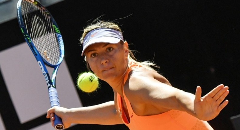 Maria Sharapova returns the ball to Christina McHale during their match at the ATP Tennis Open tournament on May 15, 2017 in Rome