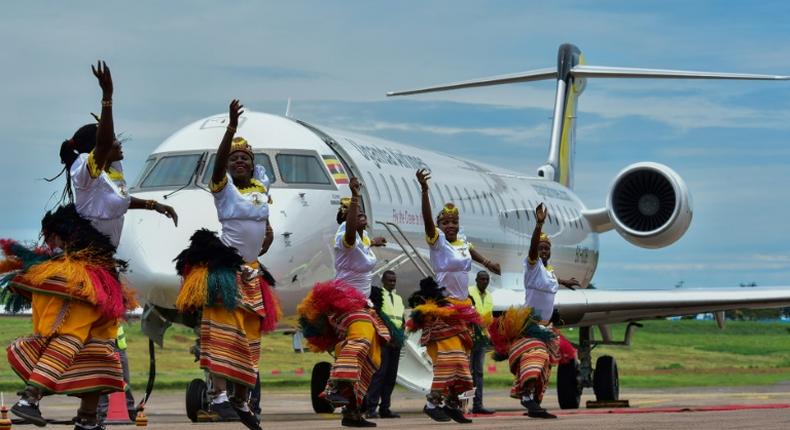 Two Bombardier CRJ900 jet airliners, which can carry up to 90 people each, landed at Entebbe airport outside the capital Kampala during a ceremony attended by President Yoweri Museveni