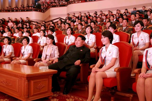 FILE PHOTO: North Korean leader Kim Jong Un and wife Ri Sol Ju enjoy an art performance given by the