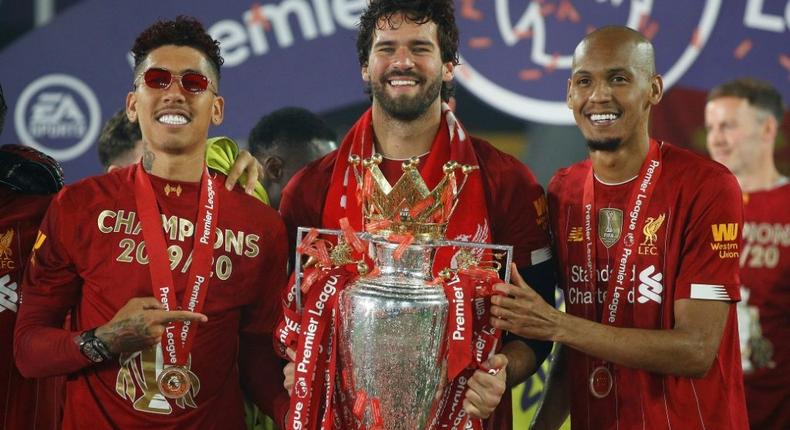 Liverpool's Brazilian trio (from left to right) Roberto Firmino, Alisson Becker and Fabinho could miss the Premier League match against Leeds Creator: PHIL NOBLE