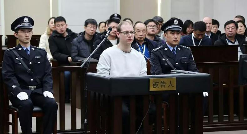 Canadian Robert Lloyd Schellenberg (C) is pictured during the retrial at which he was sentenced to death for drug trafficking