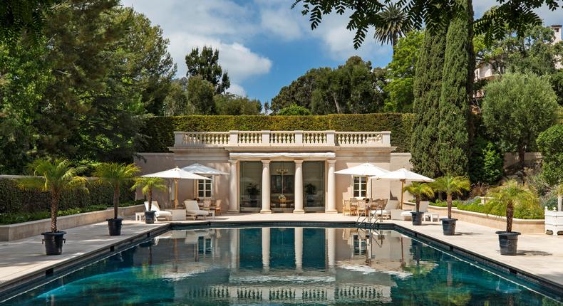 A pool house overlooks Chartwell's 75-foot swimming pool.