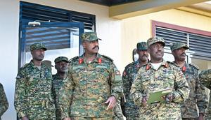 CDF Gen Muhoozi Kainerugaba with Brig. Asaph Mweteise (R) at Camp Rufu in Kiruhura district