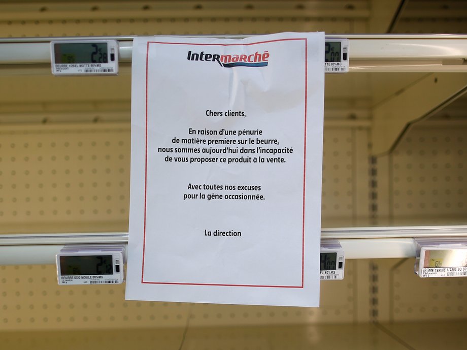 A placard explaining the butter shortage, due to a drop in milk production, is displayed on empty shelves at a supermarket in Reze, France, October 23, 2017.