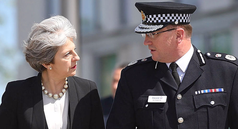 Theresa May with Greater Manchester Police Chief Constable Ian Hopkins.