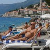 Turista na plaži - ilustracija