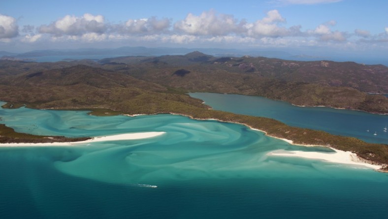 The Whitsunday Islands and Great Barrier Reef Marine Park off the east coast of Australia are known for their extraordinary natural beauty and marine life
