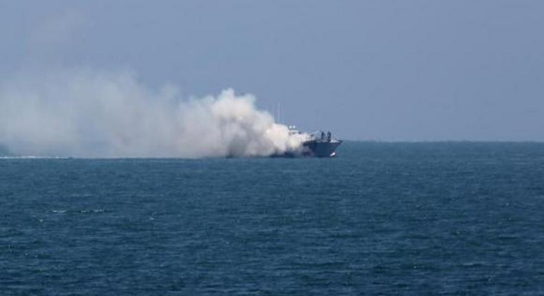 Militants clash with Egyptian coastguard, setting boat on fire