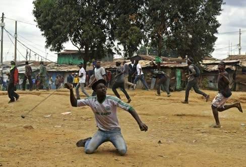 Youths pelting stones during a past demo (Twitter) 