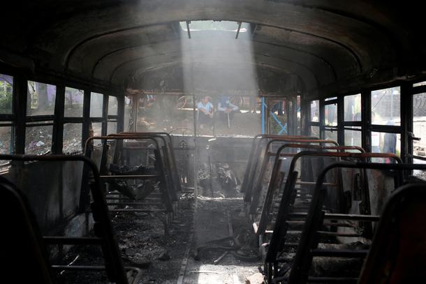 A burned bus is seen during a protest against Nicaragua's President Daniel Ortega's government in Ti