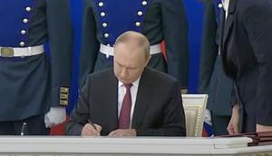 Russian President Vladimir Putin signs annexation documents in Moscow, Russia, on September 30, 2022.