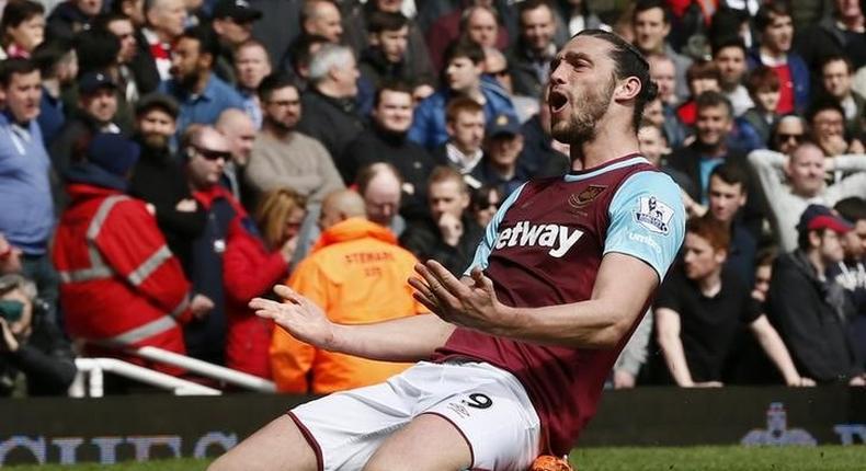 Andy Carroll celebrates scoring the second goal for West Ham against Arsenal at Upton Park on 9/4/16